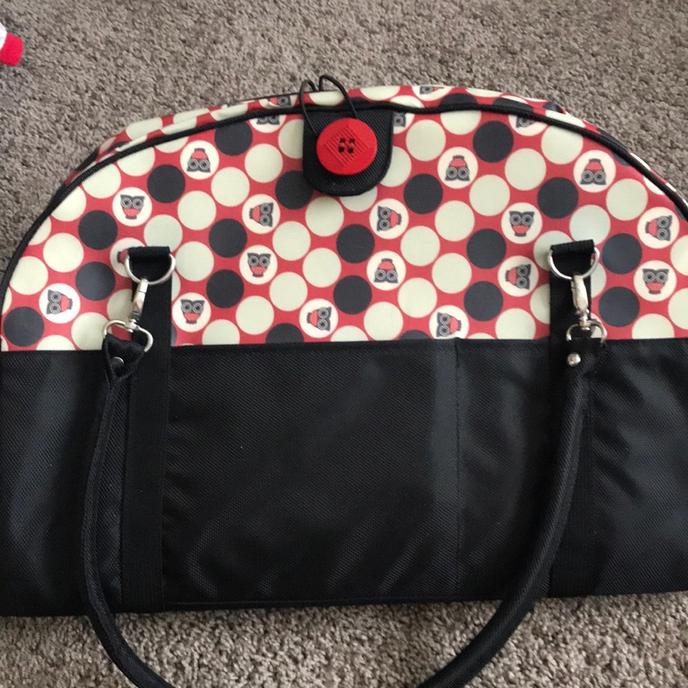 Diaper bag with table changer cloth